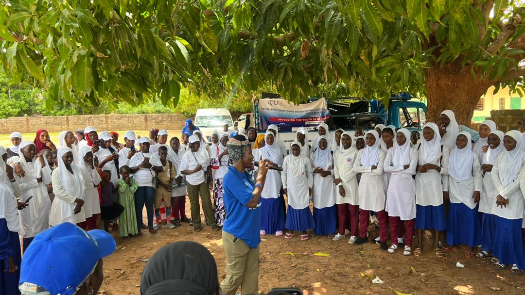 ip hop artist and activist Awa Bling performs a song about sexual and gender-based violence in the town of Kerewan in The Gambia's North Bank Region